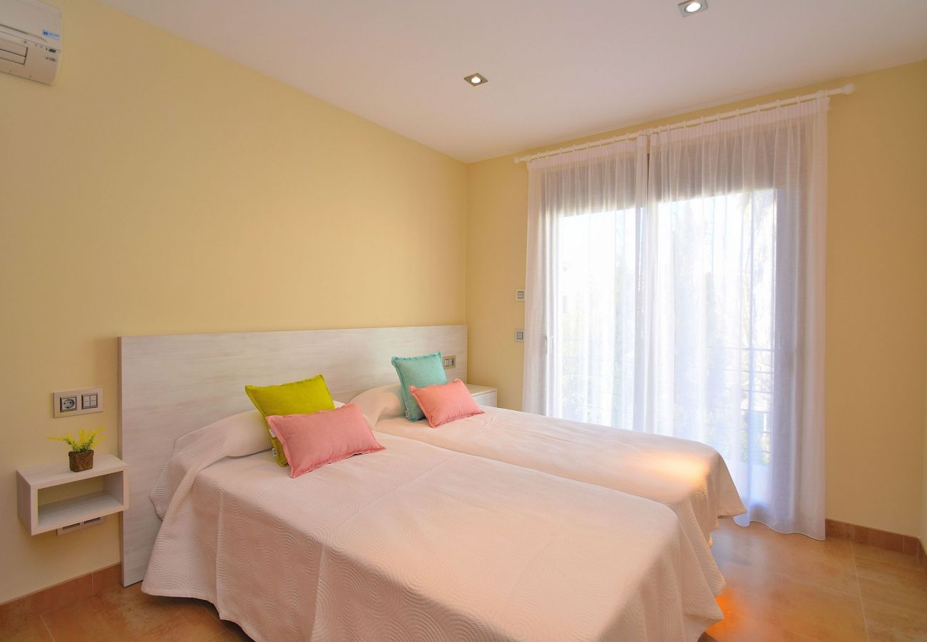 Dormitorio de la villa en Can Picafort