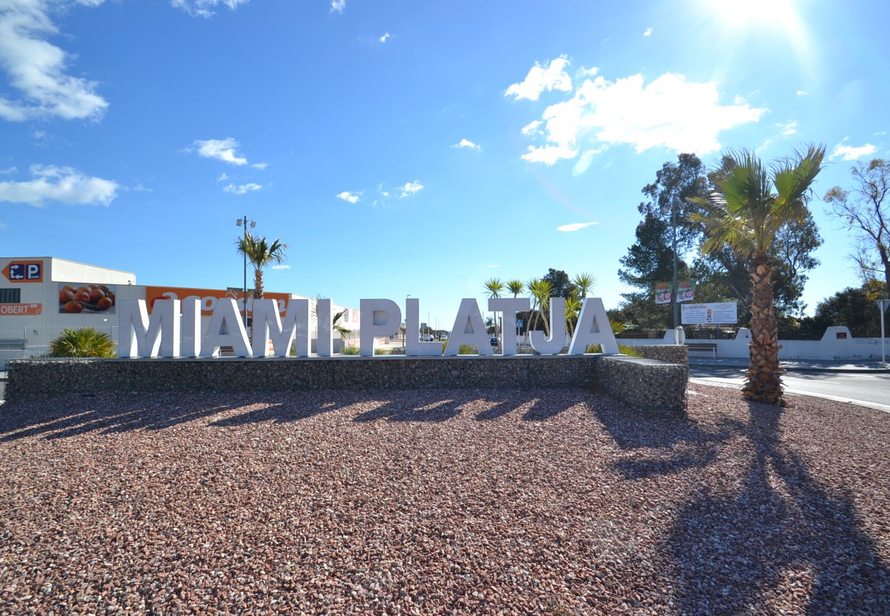 Villa en Miami Playa - Villa Verdi 11:Jardin privado-Cerca playas Miami Playa-Piscina-A/C,wifi parking incluidos