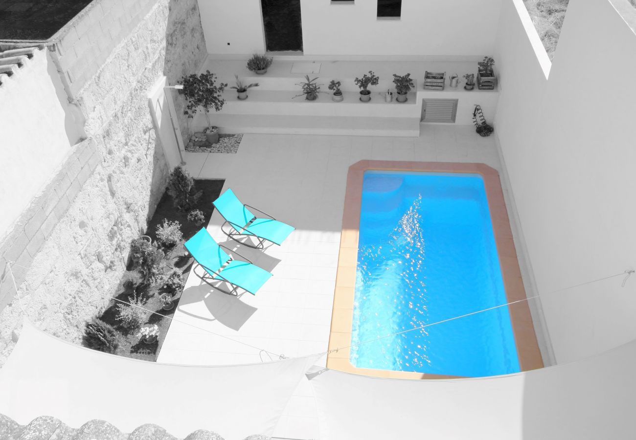 View of the pool from the first floor of the townhouse in Muro