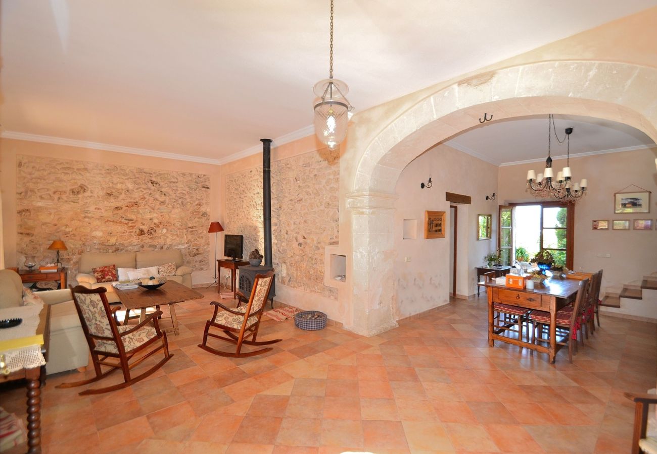 The villa has a large living room with capacity for 8 people