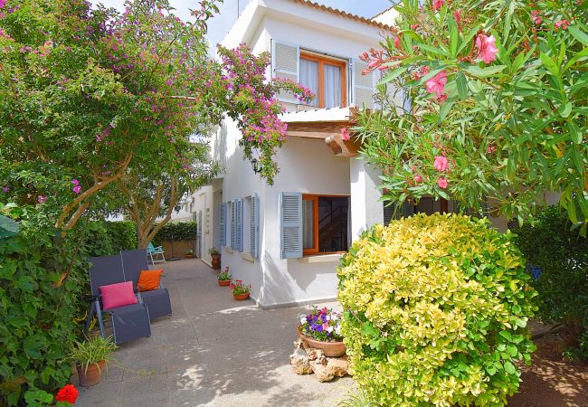  на Can Picafort - Casa Alba 159 acogedora casa de vacaciones con jardín, terraza en zona residencial, barbacoa y WiFi